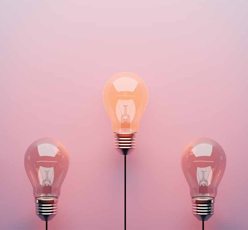 Lightbulb on a pink background